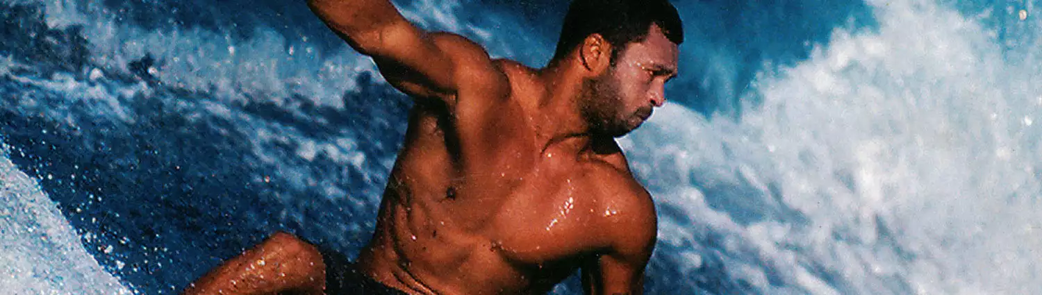 sunny-garcia-surfing.webp